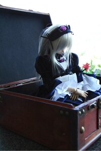 Rating: Safe Score: 0 Tags: 1girl apron black_dress doll dress frills hat long_hair long_sleeves puffy_sleeves solo suigintou User: admin