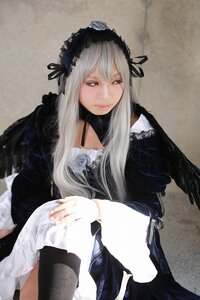 Rating: Safe Score: 0 Tags: 1girl closed_mouth dress frills gothic_lolita hairband lips lolita_fashion long_hair long_sleeves looking_at_viewer red_eyes silver_hair sitting solo suigintou wings User: admin