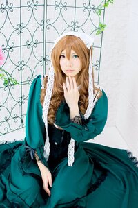 Rating: Safe Score: 0 Tags: 1girl blue_eyes brown_hair dress green_dress lace long_hair long_sleeves looking_at_viewer sitting solo suiseiseki User: admin