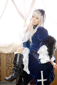 Rating: Safe Score: 0 Tags: 1girl bangs boots curtains dress frills gothic_lolita high_heel_boots high_heels lips lolita_fashion long_hair long_sleeves looking_at_viewer realistic sitting solo suigintou User: admin
