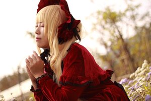 Rating: Safe Score: 0 Tags: 1girl bangs blonde_hair blurry blurry_background bonnet bow closed_eyes depth_of_field dress eyelashes flower frills lips long_hair long_sleeves profile realistic red_dress shinku solo User: admin