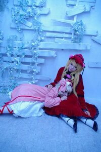 Rating: Safe Score: 0 Tags: 2girls blonde_hair bonnet bow closed_eyes dress hat long_hair long_sleeves multiple_cosplay multiple_girls red_dress ribbon shinku sitting tagme User: admin