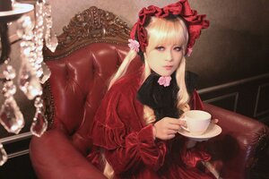 Rating: Safe Score: 0 Tags: 1girl bangs blonde_hair blue_eyes blurry bonnet chair cup depth_of_field dress flower holding_cup lips long_hair looking_at_viewer realistic red_dress rose saucer shinku sitting solo table tea teacup User: admin