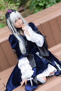 Rating: Safe Score: 0 Tags: 1girl blurry closed_mouth depth_of_field dress frills gothic_lolita hairband lace long_hair long_sleeves looking_at_viewer sitting solo suigintou wooden_floor User: admin