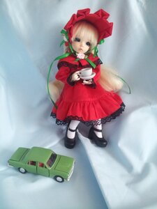Rating: Safe Score: 0 Tags: 1girl black_footwear blonde_hair blue_eyes bonnet bow bowtie doll dress long_hair long_sleeves looking_at_viewer mary_janes rain red_dress shinku shoes solo standing twintails User: admin