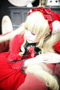 Rating: Safe Score: 0 Tags: 1girl blonde_hair blurry blurry_background blurry_foreground bow depth_of_field dress flower long_hair photo red_dress red_flower red_rose rose shinku solo User: admin