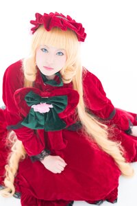 Rating: Safe Score: 0 Tags: 1girl blonde_hair blue_eyes blurry depth_of_field dress flower lips long_hair long_sleeves looking_at_viewer pantyhose red_dress rose shinku sitting solo User: admin