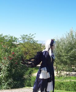 Rating: Safe Score: 0 Tags: 1girl auto_tagged blue_sky day hair_ornament hair_ribbon long_hair outdoors ribbon sky solo standing suigintou User: admin