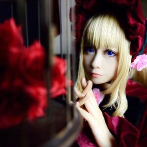 Rating: Safe Score: 0 Tags: 1girl bangs blonde_hair blue_eyes blurry bonnet depth_of_field dress flower lips looking_at_viewer realistic red_dress rose shinku solo User: admin