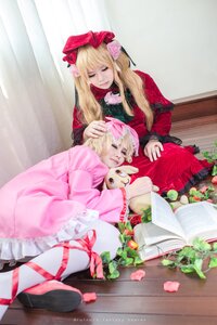 Rating: Safe Score: 0 Tags: 2girls blonde_hair closed_eyes doll dress flower hat long_hair multiple_cosplay multiple_girls ribbon sitting sleeping tagme User: admin