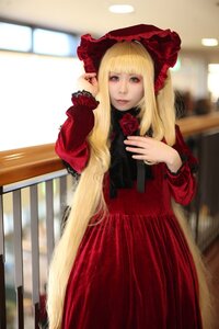 Rating: Safe Score: 0 Tags: 1girl bangs blonde_hair blue_eyes blurry bonnet bow depth_of_field dress flower indoors lips long_hair long_sleeves looking_at_viewer photo realistic red_dress rose shinku solo User: admin