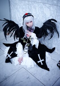 Rating: Safe Score: 0 Tags: 1girl black_dress black_wings dress feathered_wings feathers flower frills hairband long_hair long_sleeves looking_at_viewer red_eyes rose silver_hair solo suigintou wings User: admin