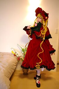 Rating: Safe Score: 0 Tags: 1girl blonde_hair blue_eyes bow dress flower long_hair rose shinku solo User: admin