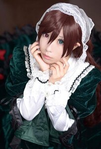 Rating: Safe Score: 0 Tags: 1girl bangs blurry brown_hair frills green_dress heterochromia lips long_hair long_sleeves looking_at_viewer realistic solo suiseiseki User: admin