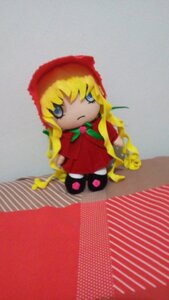 Rating: Safe Score: 0 Tags: 1girl blonde_hair blue_eyes bonnet bow bowtie capelet chibi doll dress full_body long_hair long_sleeves looking_at_viewer red_dress shinku solo User: admin