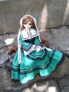 Rating: Safe Score: 0 Tags: 1girl brown_hair doll dress frills green_dress green_eyes heterochromia long_hair long_sleeves looking_at_viewer sitting solo suiseiseki very_long_hair User: admin