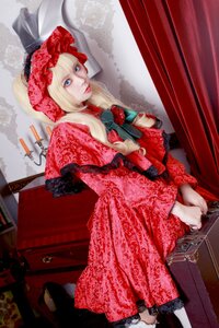 Rating: Safe Score: 0 Tags: 1girl blonde_hair blue_eyes curtains dress flower lips lipstick makeup red_dress shinku sitting solo User: admin