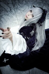 Rating: Safe Score: 0 Tags: 1girl auto_tagged black_dress dress frills gothic_lolita hairband lips lolita_fashion long_hair long_sleeves looking_at_viewer nail_polish ribbon silver_hair solo suigintou wings User: admin