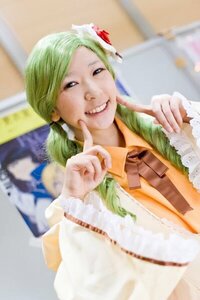 Rating: Safe Score: 0 Tags: blurry blurry_background depth_of_field flower green_hair hair_flower hair_ornament index_finger_raised kanaria photo realistic shirt smile solo User: admin