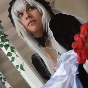Rating: Safe Score: 0 Tags: 1girl blurry blurry_foreground bouquet choker depth_of_field flower lips photo red_eyes red_flower red_rose rose solo suigintou white_hair User: admin