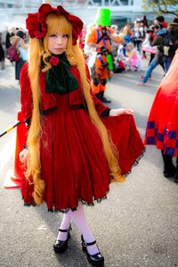 Rating: Safe Score: 0 Tags: 1girl bangs black_footwear blonde_hair blue_eyes blurry blurry_background bonnet bow depth_of_field dress flower long_hair long_sleeves looking_at_viewer pantyhose photo red_dress shinku shoes solo solo_focus white_legwear User: admin