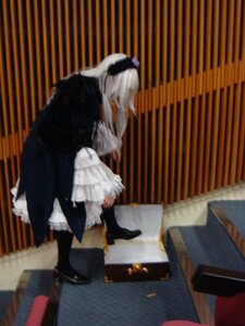 Rating: Safe Score: 0 Tags: 1girl auto_tagged black_footwear dress horns indoors long_sleeves maid solo standing striped suigintou User: admin