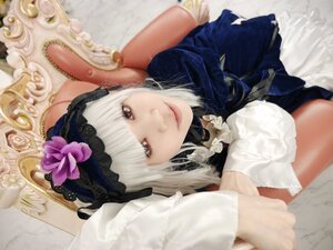 Rating: Safe Score: 0 Tags: 1girl bangs blunt_bangs closed_mouth doll_joints dress flower hair_flower hair_ornament lips looking_at_viewer lying solo suigintou upper_body white_hair User: admin