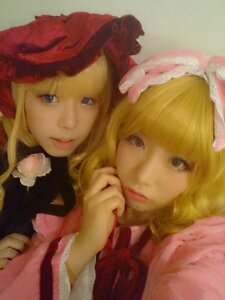 Rating: Safe Score: 0 Tags: 2girls blonde_hair blue_eyes bow hat lips looking_at_viewer multiple_cosplay multiple_girls realistic smile tagme User: admin