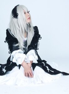 Rating: Safe Score: 0 Tags: 1girl black_dress dress gothic_lolita hair_ornament lips lolita_fashion long_hair long_sleeves profile sitting solo suigintou white_hair User: admin