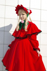 Rating: Safe Score: 0 Tags: 1girl blonde_hair blue_eyes bonnet bow bowtie brick_wall capelet chain-link_fence dress fence flower long_hair long_sleeves red_dress rose shinku solo standing tile_floor tile_wall tiles wall User: admin