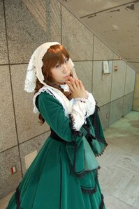 Rating: Safe Score: 0 Tags: 1girl brown_hair dress green_dress long_sleeves photo red_eyes solo suiseiseki User: admin