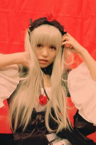 Rating: Safe Score: 0 Tags: 1girl blonde_hair flower hairband lips long_hair looking_at_viewer red_background red_flower red_rose rose solo suigintou upper_body User: admin
