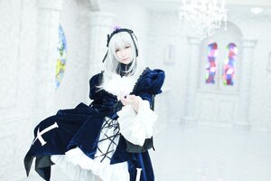 Rating: Safe Score: 0 Tags: 1girl 3d blurry blurry_background depth_of_field dress frills hairband long_sleeves photo solo standing suigintou User: admin