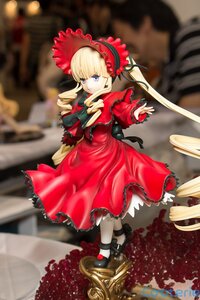 Rating: Safe Score: 0 Tags: 1girl black_footwear blonde_hair blue_eyes blurry blurry_background bonnet bow depth_of_field doll dress drill_hair full_body long_hair long_sleeves looking_at_viewer red_dress ribbon shinku shoes solo standing twintails white_legwear User: admin