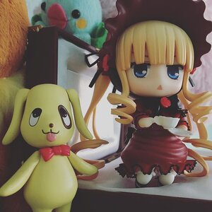 Rating: Safe Score: 0 Tags: 1girl blonde_hair blue_eyes bonnet doll dress drill_hair hat long_hair red_dress shinku solo User: admin