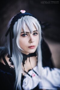 Rating: Safe Score: 0 Tags: 1girl black_ribbon blurry choker closed_mouth depth_of_field gothic_lolita hairband lips lolita_fashion lolita_hairband long_hair ribbon silver_hair solo suigintou User: admin