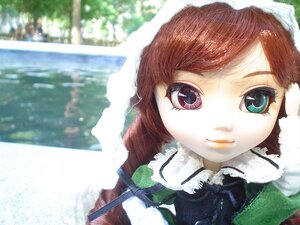 Rating: Safe Score: 0 Tags: 1girl bangs blurry brown_hair closed_mouth depth_of_field doll frilled_shirt_collar frills hat lips looking_at_viewer outdoors short_hair smile solo suiseiseki User: admin