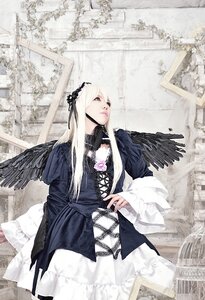 Rating: Safe Score: 0 Tags: 1girl black_wings dress feathered_wings feathers flower frills gothic_lolita hairband lace lolita_fashion long_hair long_sleeves rose solo standing suigintou wings User: admin