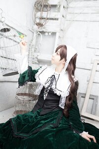 Rating: Safe Score: 0 Tags: 1girl birdcage brown_hair cage dress frills green_dress lace lolita_fashion long_hair long_sleeves profile sitting solo suiseiseki User: admin