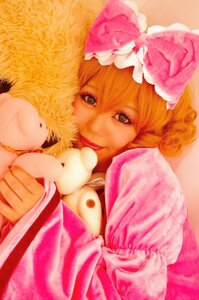 Rating: Safe Score: 0 Tags: 1girl blonde_hair bow dress hair_bow hinaichigo looking_at_viewer lying pink_bow pink_dress puffy_sleeves smile solo stuffed_animal traditional_media User: admin