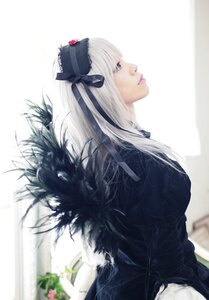 Rating: Safe Score: 0 Tags: 1girl blurry depth_of_field dress frills gothic_lolita lips lolita_fashion long_hair long_sleeves profile ribbon silver_hair solo striped suigintou User: admin