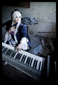 Rating: Safe Score: 0 Tags: 1girl bass_guitar dress electric_guitar feathers flower frills guitar instrument keyboard_(instrument) letterboxed long_hair music piano silver_hair solo suigintou wings User: admin