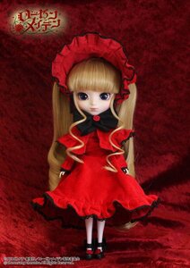 Rating: Safe Score: 0 Tags: 1girl blonde_hair blue_eyes bonnet bow bowtie capelet doll dress frills full_body long_hair long_sleeves looking_at_viewer red_dress shinku shoes sitting solo twintails very_long_hair User: admin