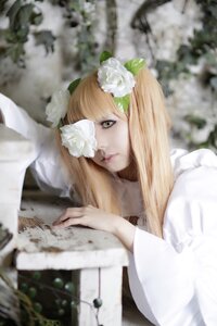 Rating: Safe Score: 0 Tags: 1girl blonde_hair blurry blurry_background blurry_foreground depth_of_field dress flower hair_flower hair_ornament kirakishou leaf lips long_hair motion_blur photo solo white_flower white_rose yellow_eyes User: admin