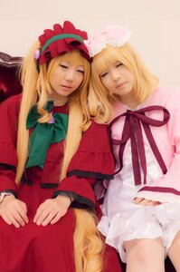 Rating: Safe Score: 0 Tags: 2girls blonde_hair bow closed_eyes dress lips long_hair multiple_cosplay multiple_girls realistic ribbon siblings sitting sleeping tagme User: admin