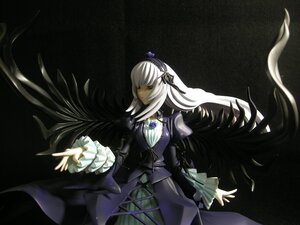 Rating: Safe Score: 0 Tags: 1girl black_background closed_mouth doll dress flower frilled_sleeves frills hairband long_hair long_sleeves looking_at_viewer outstretched_arm outstretched_hand red_eyes silver_hair solo suigintou very_long_hair wings User: admin