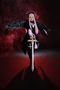 Rating: Safe Score: 0 Tags: 1girl black_wings dress feathered_wings feathers hairband holding holding_weapon long_hair long_sleeves solo standing suigintou sword weapon white_hair wings User: admin