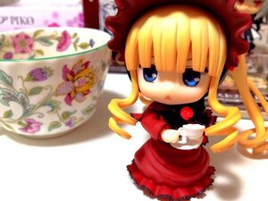 Rating: Safe Score: 0 Tags: 1girl blonde_hair blue_eyes blurry bonnet chibi depth_of_field doll dress drill_hair figure food long_hair long_sleeves looking_at_viewer photo red_dress shinku simple_background solo standing white_background User: admin