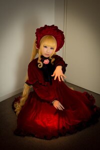 Rating: Safe Score: 0 Tags: 1girl bangs blonde_hair blue_eyes bonnet dress flower long_hair long_sleeves looking_at_viewer red_dress rose shinku sitting solo twintails User: admin