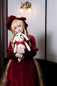 Rating: Safe Score: 0 Tags: 1girl blonde_hair blue_eyes bonnet bow dress long_hair looking_at_viewer red_dress shinku solo User: admin